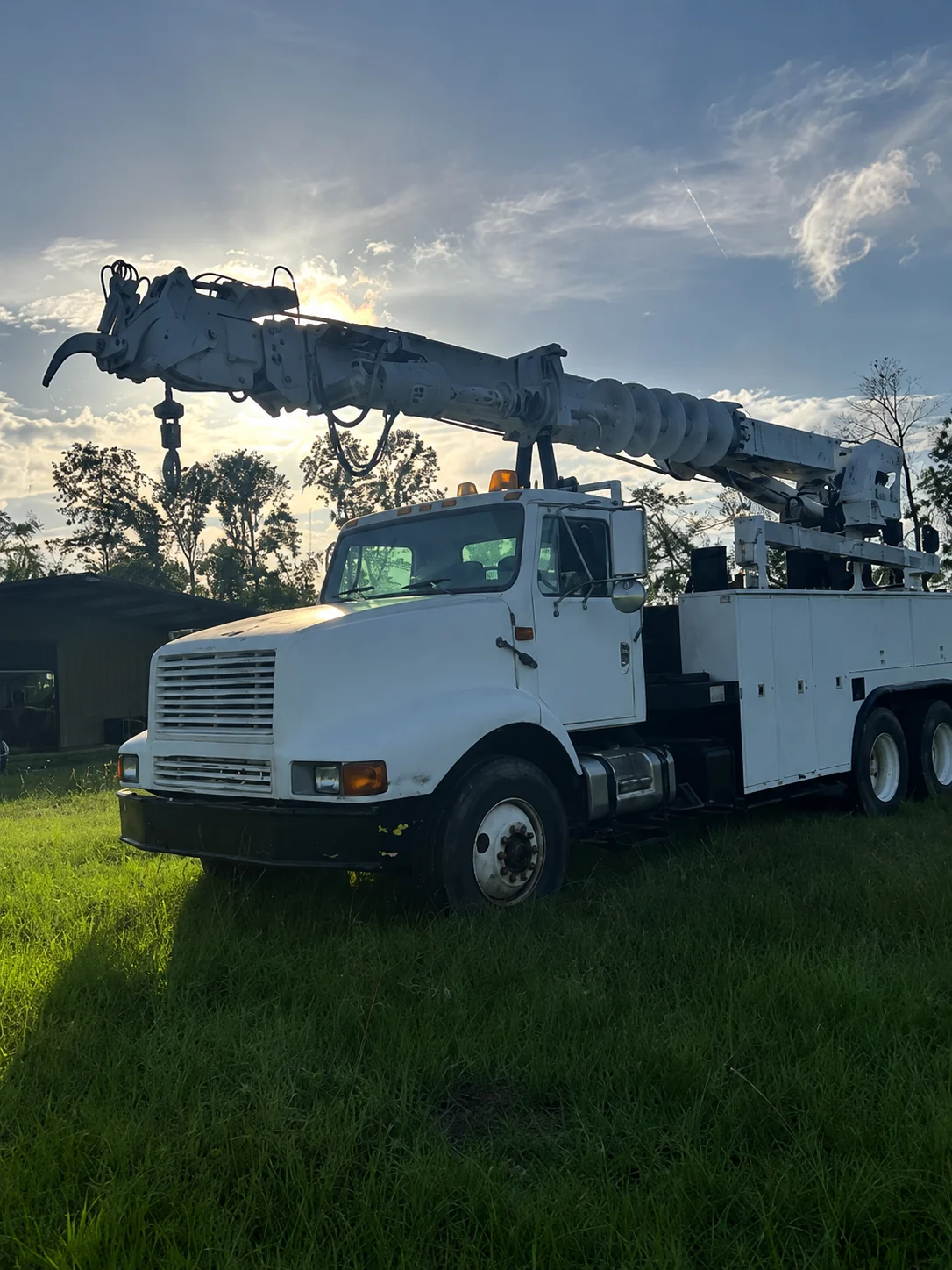 Wilburn Tree Service bucket truck in the field